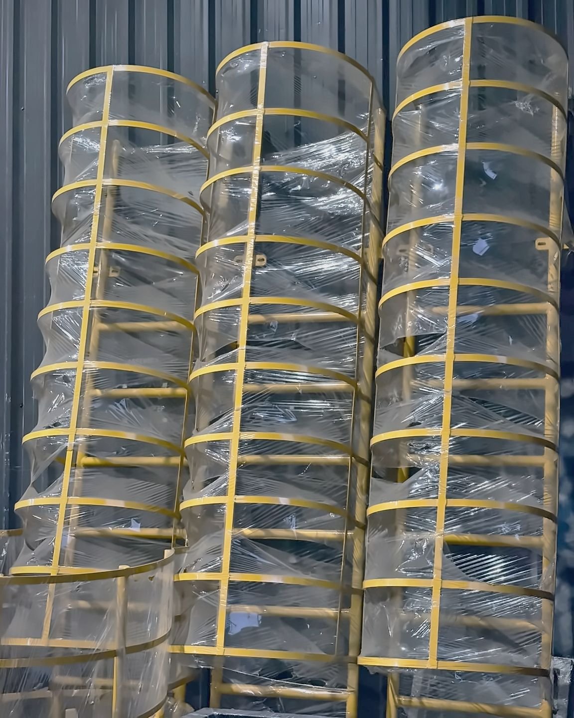 Yellow fabricated safety cage guards made by Dream Three
